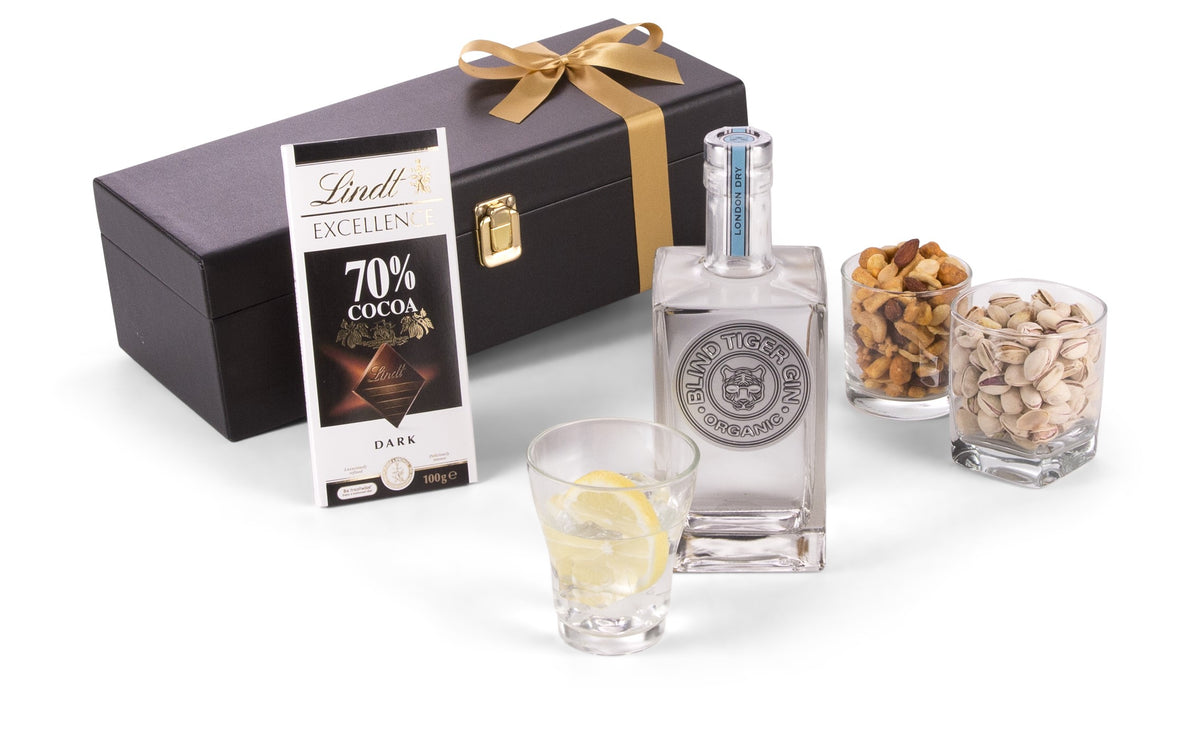 Open bottle of Blind Tiger Gin by Interhampers showing clear glass and gin inside, with a minimalist label design.