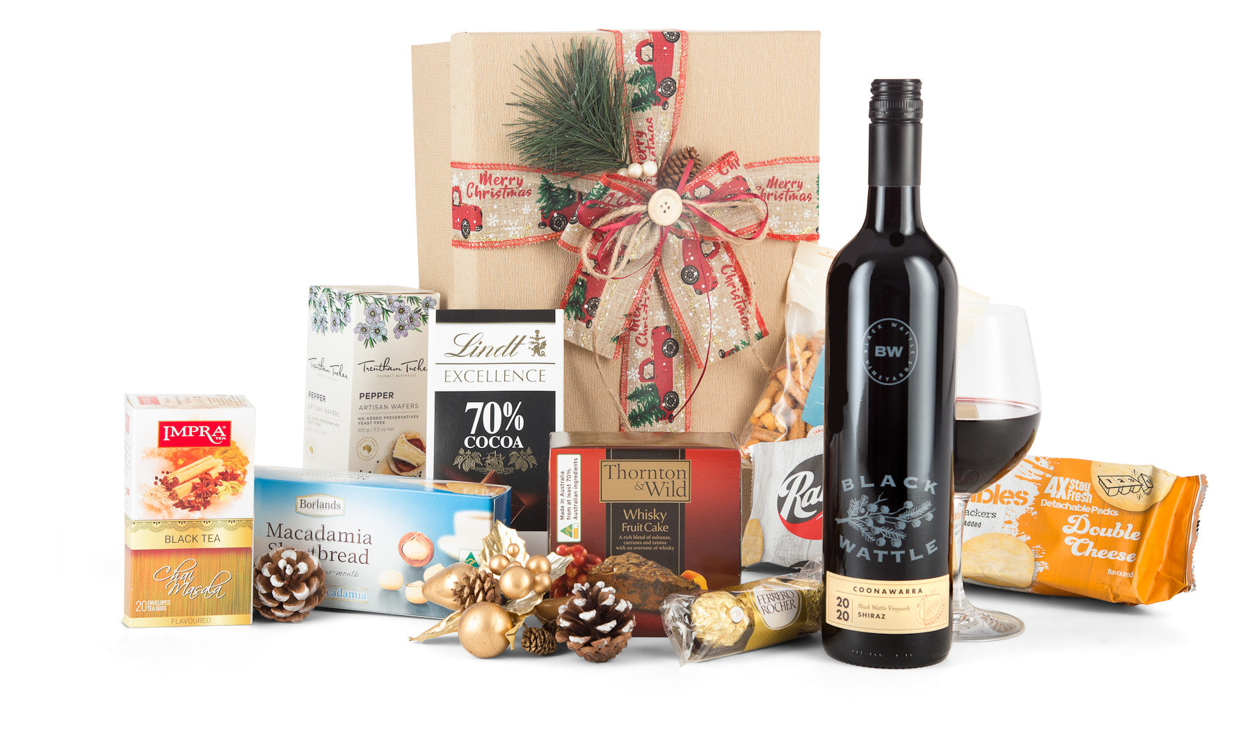 Open red Christmas gift box with "Merry Christmas" message from Interhampers, featuring festive wrapping and ribbon.