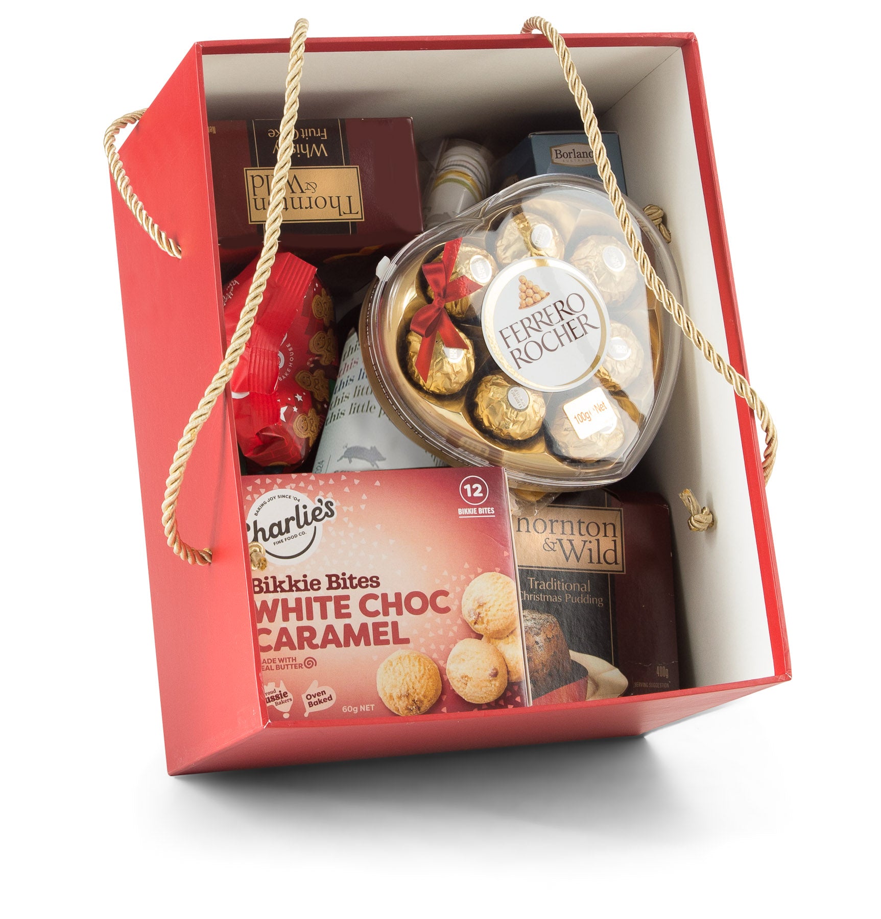 Assorted Sweet Christmas treats in festive packaging by Interhampers, ready for holiday gift giving.