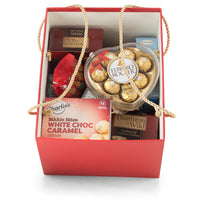 Packed red Christmas gift box from Interhampers with festive wrapping and ribbon, ready for holiday celebration.