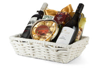 Colorful gift box from Interhampers labeled "Perfect Gift" with decorative wrapping and a ribbon, ready for giving.