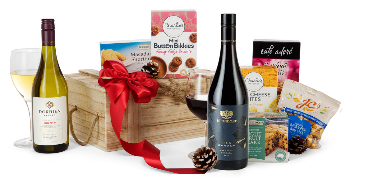 Open box of Aussie Delight chocolates by Interhampers, showcasing a variety of colorful chocolate treats inside.