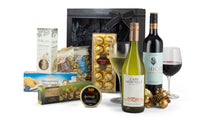 Open cardboard box with packing from Interhampers Ideal Choice product, showing packaging materials and interior view.