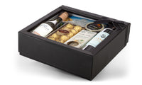 Packed bundle of Ideal Choice products from Interhampers, showcasing a variety of packaged items in a clear display.