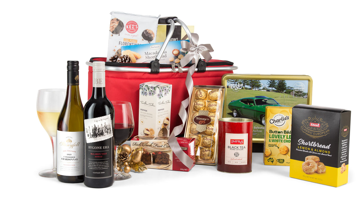 Open Interhampers The Shoppers Choice shopping basket with handles, made of woven material, on a plain background.