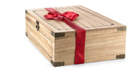 Closed Canadian Club whiskey chest by Interhampers, featuring a wooden storage box with the brand logo on the lid.
