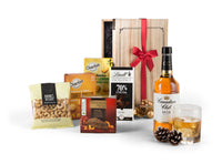 Open Canadian Club whiskey chest by Interhampers showing the wooden interior and packaging for storage or display.