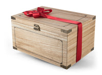Closed view of Interhampers treasure chest with ornate metal accents and wooden construction, showcasing detailed craftsmanship.