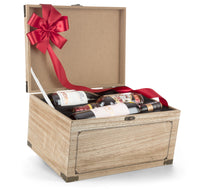 Interhampers treasure chest filled with gold coins and jewelry, wooden container with detailed carvings and vintage design.