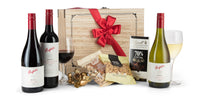 Open Penfolds Trio Pack with three wine bottles from Interhampers, showcasing elegant labels and bottle shapes.