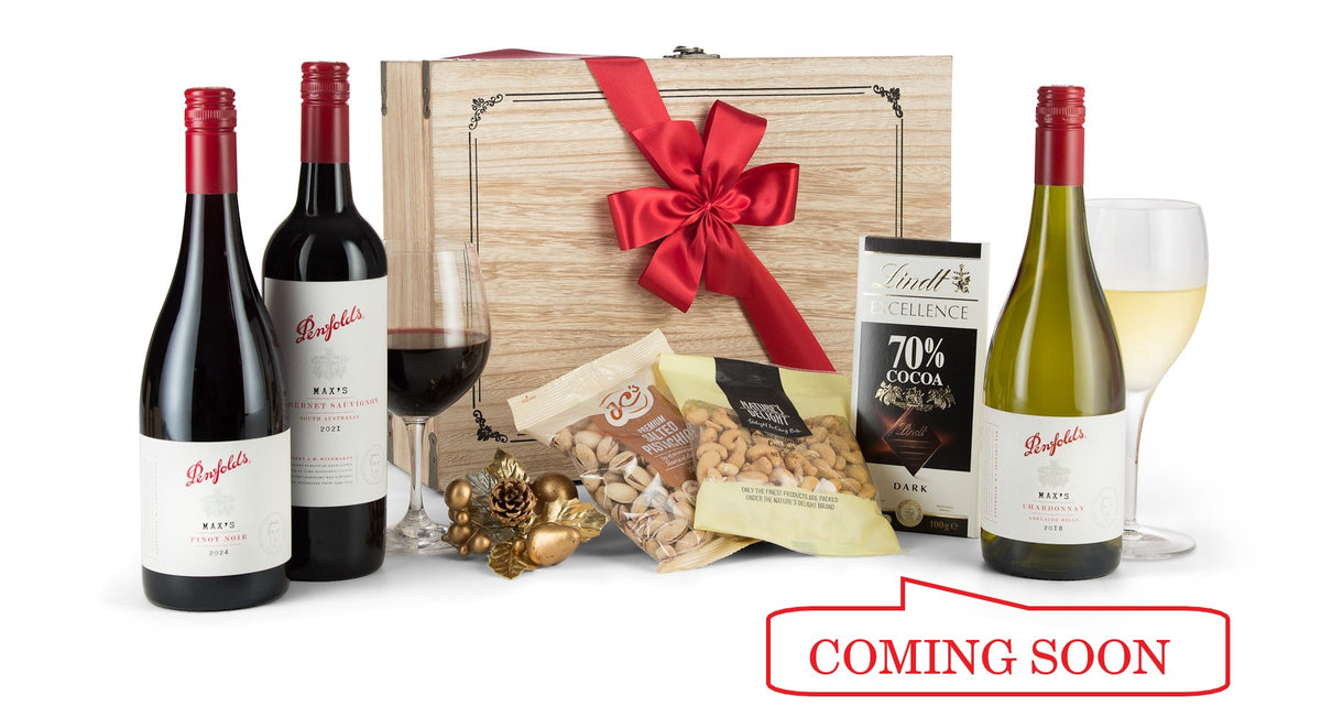 Open Penfolds wine bottle in the Penfolds Trio Pack, showcasing the elegant packaging and wine label details.