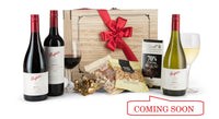 Open Penfolds wine bottle in the Penfolds Trio Pack, showcasing the elegant packaging and wine label details.