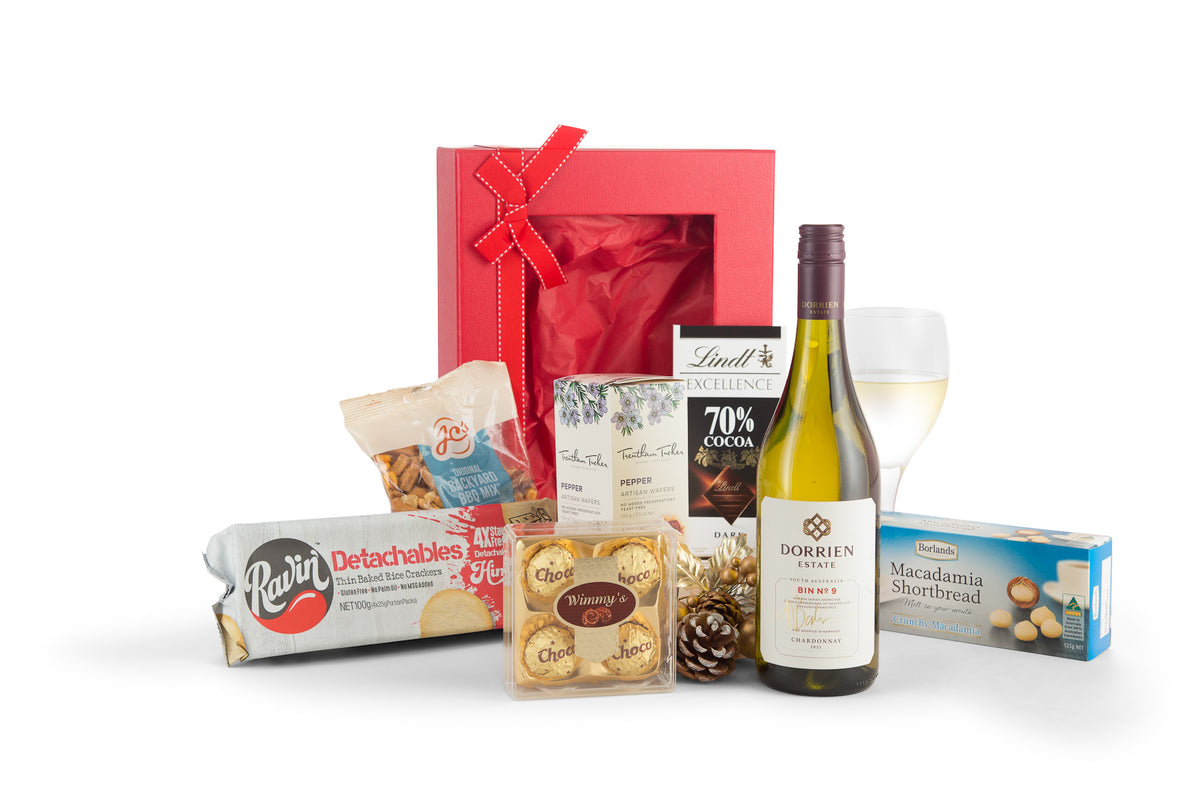 Open box of Perfect White by Interhampers showcasing neatly packed white hampers with handles and breathable fabric.