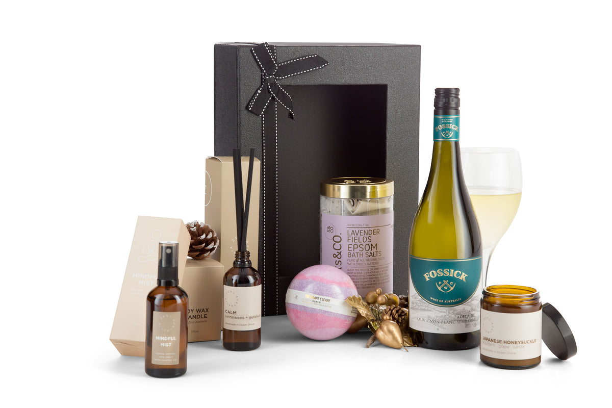 Open box of Just Relax Interhampers herbal tea set with assorted tea bags and packaging.